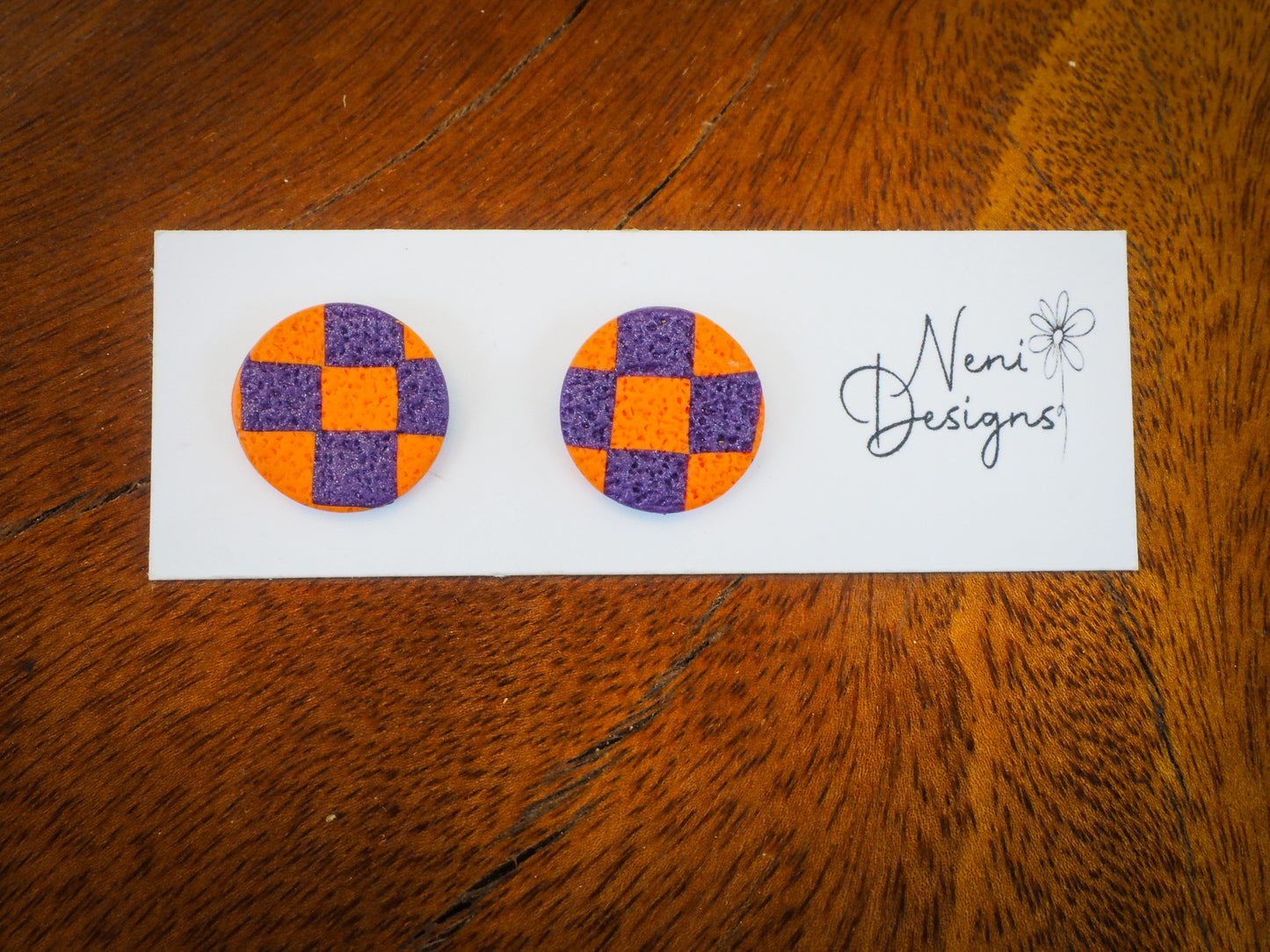 purple and orange checker round stud