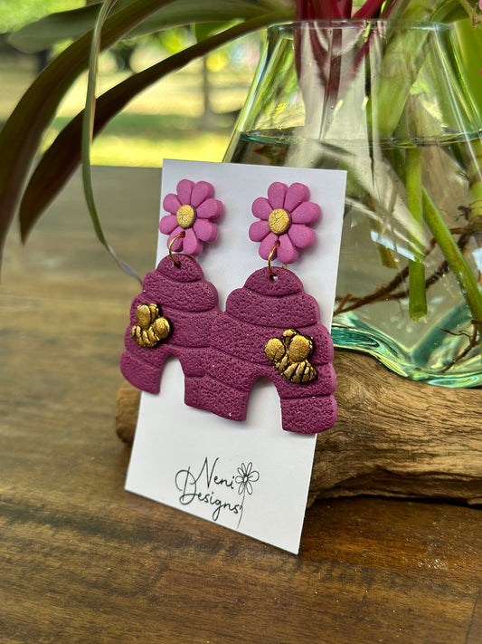 'buzzy beehive' purple and gold