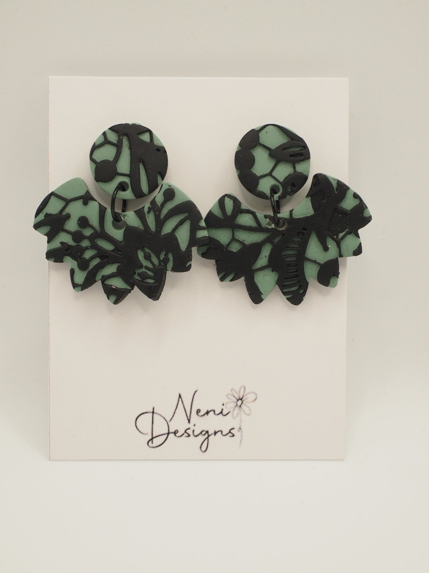 'turia' (green with black lace)
