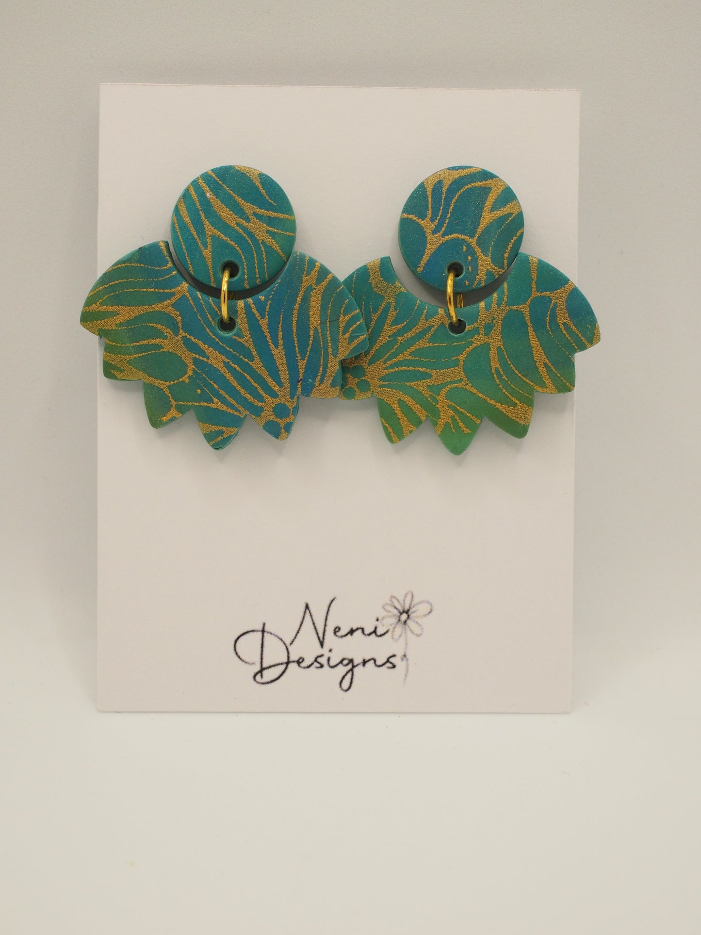 'turia' (bluey green with gold)