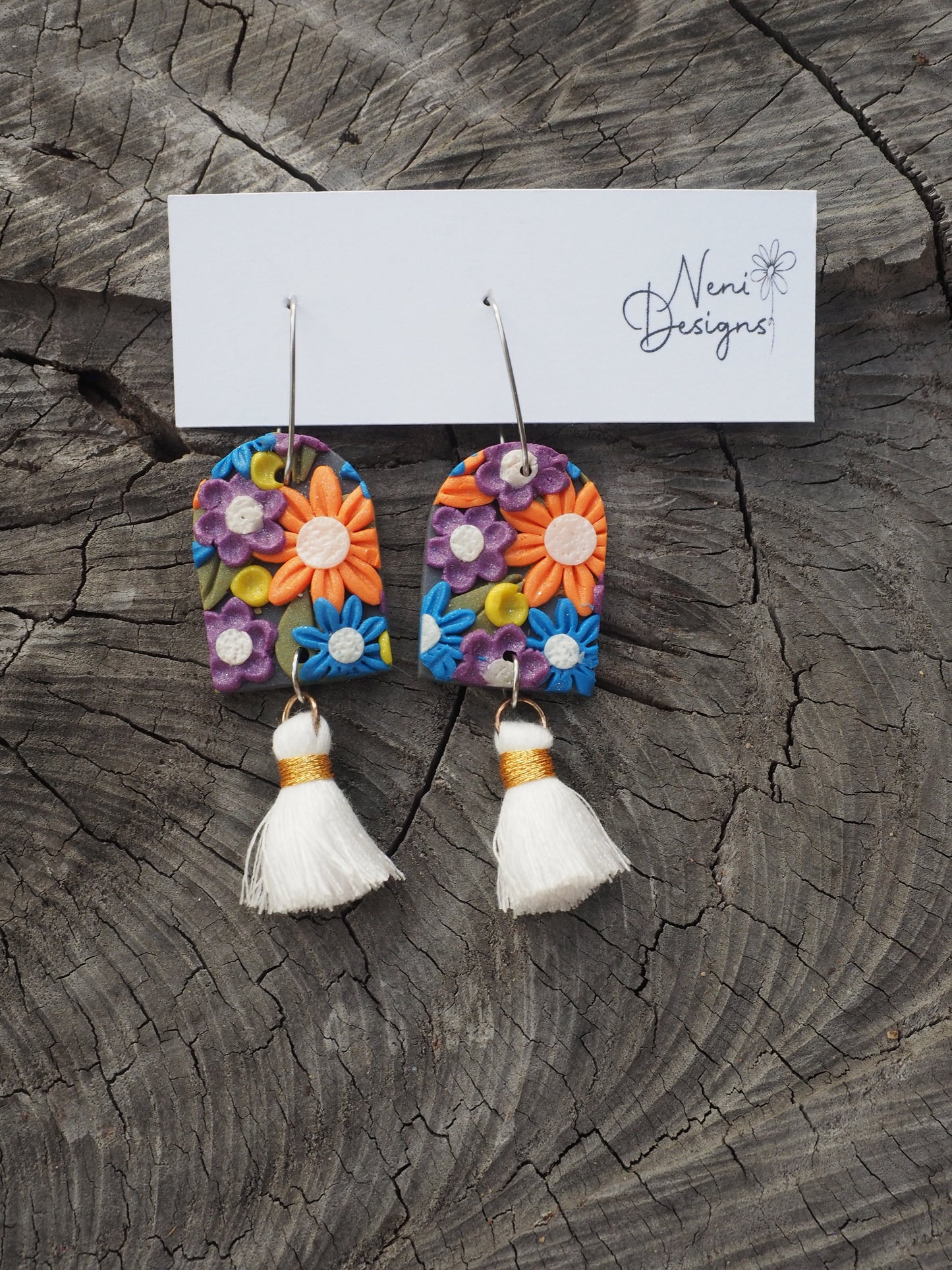 'maya' (orange, blue and purple florals)
