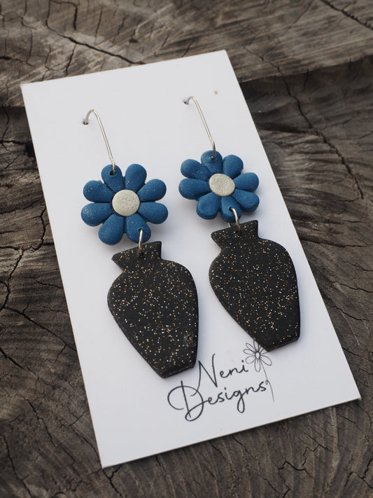 'floral' (dark blue flower with glittery black vase)