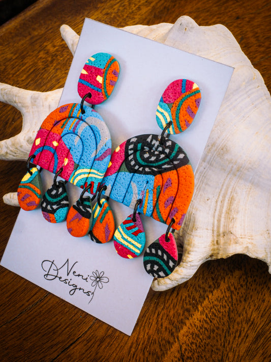 'rainbow' pop' olivia dangles