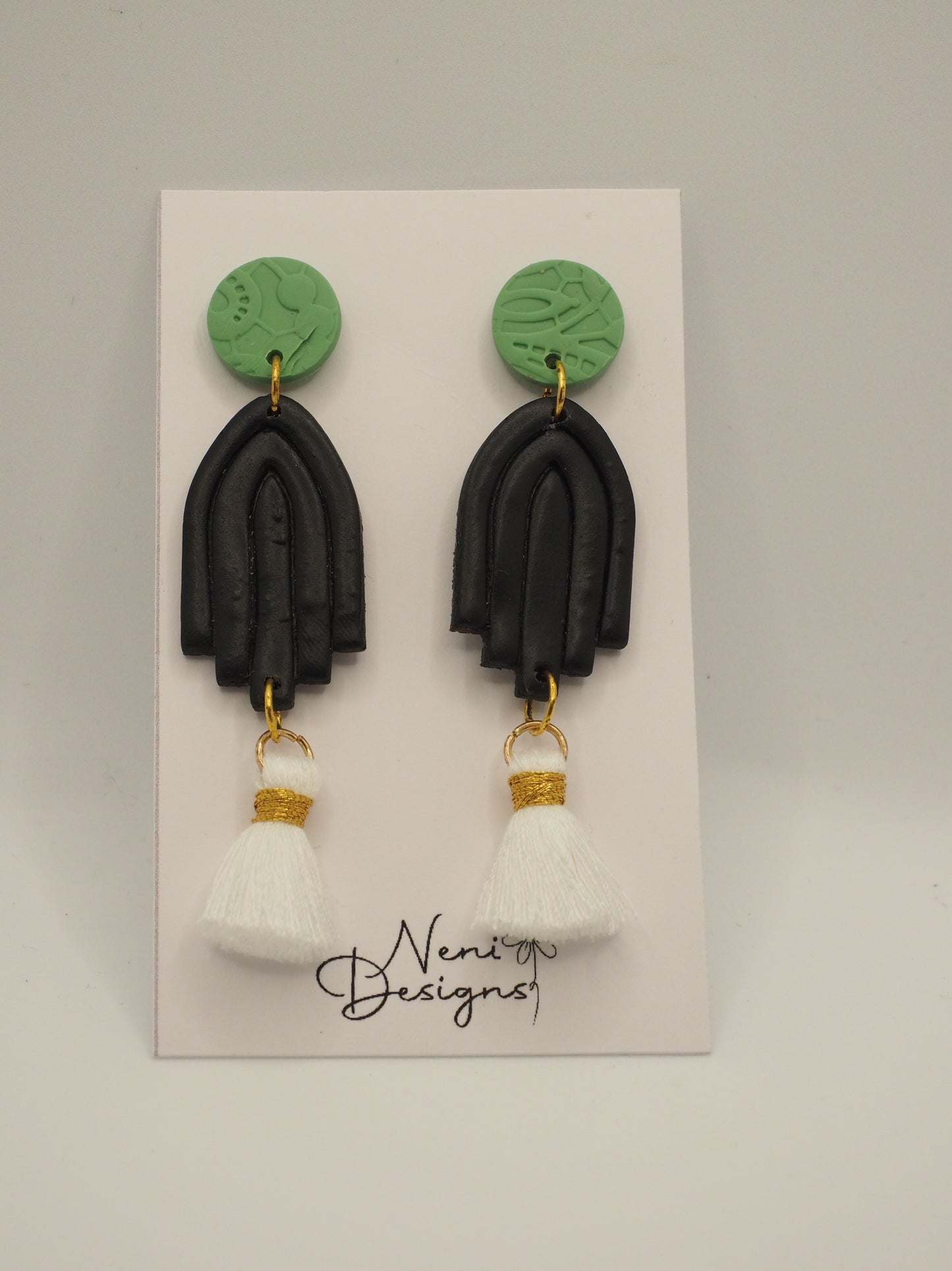 'evelyn' with tassels (green, black and white)