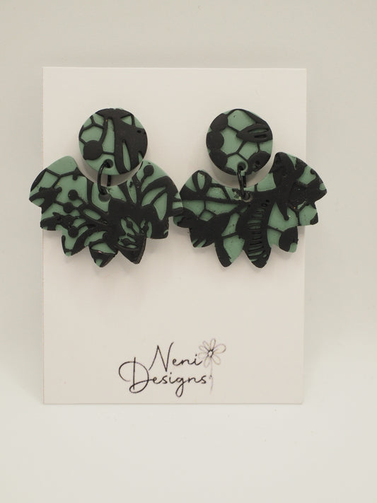 'turia' (green with black lace)
