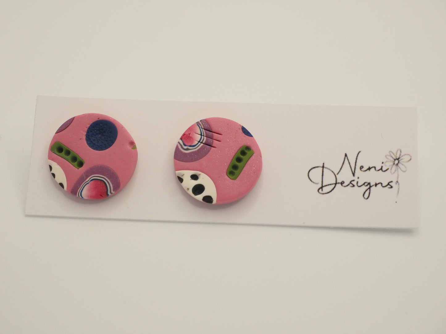 textured studs (pink, purple, green and blue)