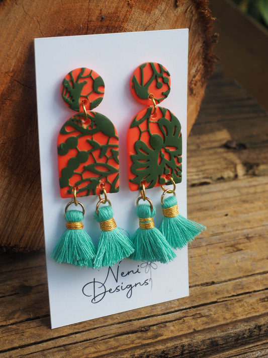 'maya' with tassels (orange and dark green)
